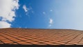 Roof on blue sky background.Concrete ceramic rooftop construction design.Structure texture detail architecture outdoor.abstract