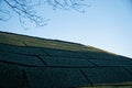 Roof on blue sky background, design element, backdrop for web site or mobile devices Royalty Free Stock Photo