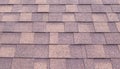 Roof of brown shingles background and texture. Royalty Free Stock Photo