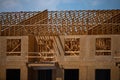 Roof building. Standard timber framed building with roof trusses. Roof Timber Frame house. The frame of the new build Royalty Free Stock Photo