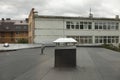 Roof of building. Tar on roof. Architectural details. Ventilation pipe on house Royalty Free Stock Photo