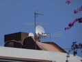 Antennas of communications on the roof over blue sky