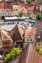 Roof of the Cathedral of Saint Mary and view of The Small Square Piata Mica, Sibiu, Romania