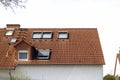 Roof of classic residential houses with orange roofing tiles and Royalty Free Stock Photo