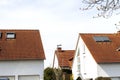 Roof of classic residential houses with orange roofing tiles and Royalty Free Stock Photo