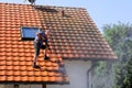 Roof cleaning with high pressure Royalty Free Stock Photo