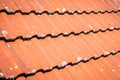 Roof closeup, roofing tiles macro - red roof tile pattern