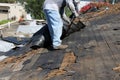 Roof construction site. Removal of old roof, replacement with new shingles, equipment and repair. Roofs are a very important part Royalty Free Stock Photo