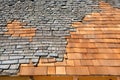 Roof construction site. Removal of old roof, replacement with new shingles, equipment and repair Royalty Free Stock Photo