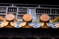 Roof decorations in the Forbidden Citadel in Hue during a rainy day, Vietnam