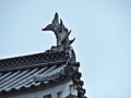 Roof details of Aizuwakamatsu Castle in Japan.