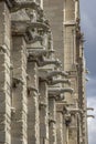 Roof figures of scary gargoyles at main facade of Notre Dame de Paris cathedral in Paris, France, closeup, details Royalty Free Stock Photo