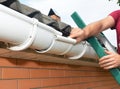 Roof gutter repair. Guttering repair. Roofer contractor repair rain gutter