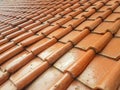 the roof of house made with rooftile.brown clay tile texture Royalty Free Stock Photo