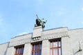 Roof of house with statue