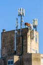 Roof of industrial building with GSM antennas Royalty Free Stock Photo