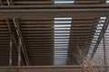 The roof of the industrial hall with a view of the sky in the window openings (ventilation, skylights!?). Royalty Free Stock Photo