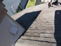 Roof leak repairs on residential shingle in process Royalty Free Stock Photo