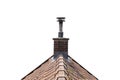 Roof made of ceramic tiles and a brick chimney. isolated