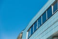 Roof of a modern building against the sky. Royalty Free Stock Photo