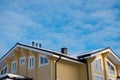 Roof modern cottage on a blue sky background Royalty Free Stock Photo