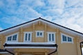 Roof modern cottage on a blue sky background Royalty Free Stock Photo