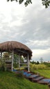 the roof of the monument which resembles a honai is made of piles of straw leaves and some use sago leaves Royalty Free Stock Photo