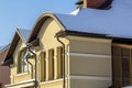 Roof of a new built house with nice window and chimney. Royalty Free Stock Photo