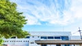 roof of office building trees sky Royalty Free Stock Photo