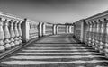 Freestone banisters with shadows on the floor, in Black and white Royalty Free Stock Photo