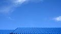 Roof pattern on blue sky. Royalty Free Stock Photo
