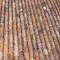 Roof of red old grunge weathered tiles Royalty Free Stock Photo