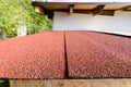 For the roof, a red roll flexible bituminous tile was used