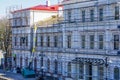 Roof repair of a historic building, restoration and painting of the facade