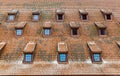 Attic windows and old tiled roof Royalty Free Stock Photo