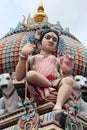 A colored Hindu deities on the roof of Sri Mariamman Hindu temple in Chinatown Singapore