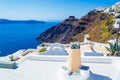 Roof terrace with beautiful sea view Caldera cliff face Santorini Greece