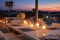 Roof terrace with festive table setting for romantic dinner by candlelight with city view. Decorations for Valentine Royalty Free Stock Photo