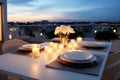 Roof terrace with festive table setting for romantic dinner by candlelight with city view. Decorations for Valentine Royalty Free Stock Photo