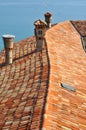 Roof tiles and mediterranean sea Royalty Free Stock Photo