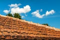 Roof tiles. Roofing texture. Red corrugated tile element of roof Royalty Free Stock Photo
