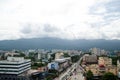 Roof Top of the city at Chiangmai along the cloud with the sunny Sky.