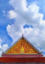 roof top of temple with beautiful Thai art and the sky