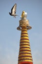 Roof of tower with a pigeon in tar Lamasery Royalty Free Stock Photo