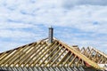 Roof trusses connected to the roof truss, not covered with a roof, with a steel I-beam instead of a corner rafter. Royalty Free Stock Photo