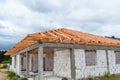 Roof trusses not covered with ceramic tile on a detached house under construction, visible roof elements, battens, counter battens Royalty Free Stock Photo