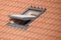 Roof with vasistas or velux windows
