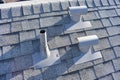 Roof Vent Penetrations on New Gray Shingled Roof