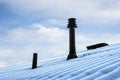 Roof with ventilation pipe and flue terminal in winter Royalty Free Stock Photo