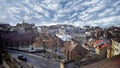 Roof view of fabulous buildings in small European town, amazing cloudy sky above